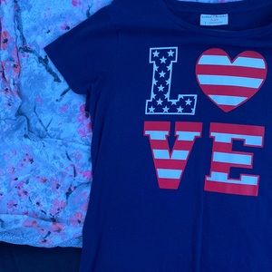 Dark blue love shirt! It saids large but fits like a medium!